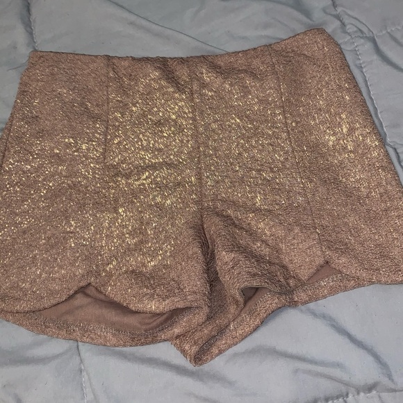 Charlotte Russe Pants - Tan and gold booty shorts